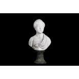 AN EARLY 19TH CENTURY NEO-CLASSICAL WHITE MARBLE BUST OF A YOUNG BOY depicting all' antica wearing
