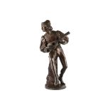 PAUL FOURNIER (FRENCH, 1859-1926): A LARGE BRONZE FIGURE OF A MINSTREL PLAYING A LUTE the figure