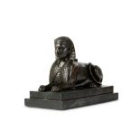 A 19TH CENTURY FRENCH BRONZE MODEL OF A SPHINX the reclining beast on a stepped marble plinth,