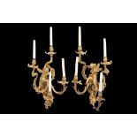 A LARGE AND IMPRESSIVE PAIR OF 19TH CENTURY FRENCH GILT BRONZE FIGURAL WALL LIGHTS IN THE ROCOCO