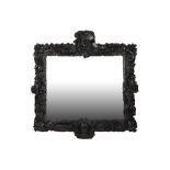 A LARGE MID 19TH CENTURY VENETIAN CARVED AND STAINED WOOD WALL MIRROR the ornate frame carved in the