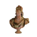 AN 18TH CENTURY STYLE LIFE-SIZE TERRACOTTA BUST OF PEACE looking to dexter and wearing a laurel