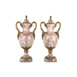 A PAIR OF LATE 19TH / EARLY 20TH CENTURY FLEUR DE PECHE MARBLE AND GILT BRONZE MOUNTED URNS in the