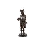 A LATE 19TH CENTURY FRENCH BRONZE FIGURE OF A MEDIEVAL WARRIOR Standing a contra-posto and holding