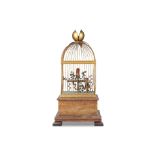 A FIRST HALF 20TH CENTURY FRENCH DOUBLE SINGING BIRD IN CAGE AUTOMATON each of the brightly coloured