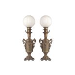 A PAIR OF LATE 19TH CENTURY BRONZE LAMP BASES WITH GLASS SHADES the oil lamp bases with removable