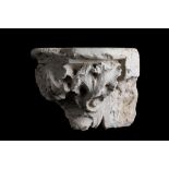 A FRENCH GOTHIC CARVED LIMESTONE CORBEL CARVED WITH A GROTESQUE BEAST, PROBABLY 13TH / 14TH