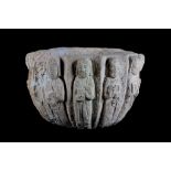 A 12TH CENTURY BYZANTINE CARVED STONE HOLY WATER VESSEL DEPICTING THE TWELVE APOSTLES carved in