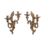 A PAIR OF 19TH CENTURY BRONZE ROCOCO STYLE WALL LIGHTS the backplates modelled as scrolling acanthus