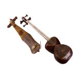 A GROUP OF TWO STRINGED MUSICAL INSTRUMENTS TO INC