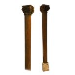A pair of carved wood Corinthian columns, each wit