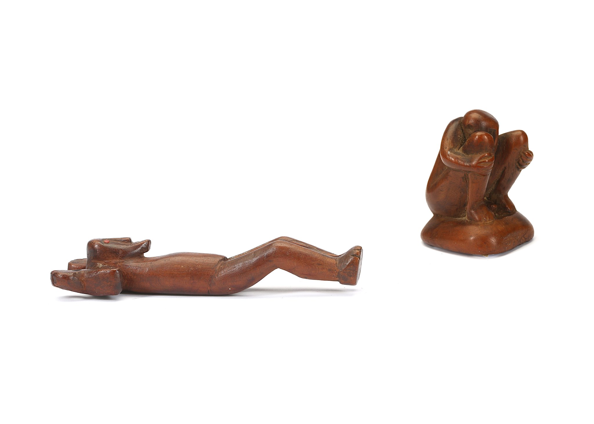 TWO POLYNESIAN WOOD FIGURES  One figure standing with arms raised, palms up, the palms pierced in - Image 2 of 4