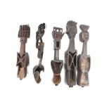 FIVE WOOD MUSICAL INSTRUMENTS All formed of hollow and solid wood elements, Including two of