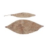 TWO HEAD AND BODY ORNAMENTS, PAPUA NEW GUINEA Two leaf shaped fiber ornaments for attachments to
