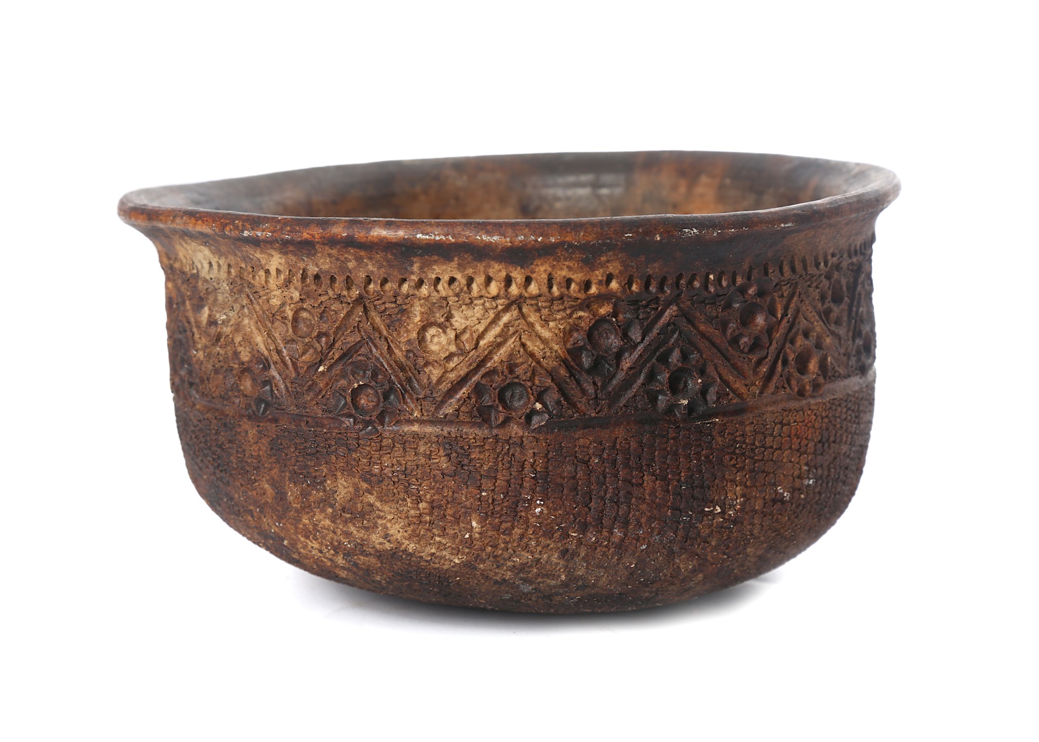 A PAPUA NEW GUINEA COOKING POT A traditional clay pot for cooking on an open fire, with stippled and