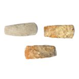 A GROUP OF FLINT AXE HEADS  All of typical oblong form, including a pale grey example with a