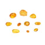 A GROUP OF AMBER FRAGMENTS 1cm - 2.1cm long, (10) Footnotes: Amber has been considered to be as