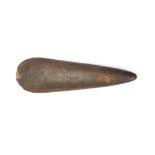 A NEOLITHIC STONE AXE Of elongated tear drop form, with a curved sharp cutting edge, tapering to