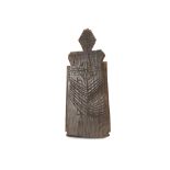 TWO AFRICAN WOOD OBJECTS Including a boundary marker with simple carved markings, 3.7cm long; and