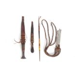 TWO AFRICAN BLADES AND TWO TRIBAL ITEMS  The two leaf shaped blades cased in leather sheaths with