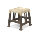 AN AFRICAN CARVED WOOD STOOL  An African hardwood stool from the Tutsi peoples, with intricately