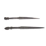 TWO SPEARS WITH FIGURAL FINIALS With long tapering blades and cylindrical handles, one has a