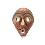 A PENDE WOOD MASK, DEMOCRATIC REPUBLIC OF CONGO  With a heart shaped face, the mask has protruding