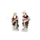 A pair of Dresden porcelain figures of Malabar musicians