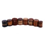 Seven Rhodesian leather covered straw work cigarette tins