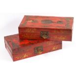 A pair of Chinese red lacquered leather hinged boxes