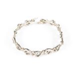 A silver 'Loving Heart' bracelet by Paloma Picasso for Tiffany & Co.