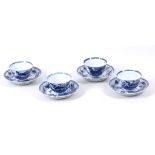 A set of four blue and white 'Phoenix and Birds' tea bowls and saucers