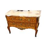 A Louis XVI gilt bronze mounted kingwood commode