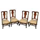 A set of four Venetian splat back dining chairs