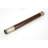 A brown leather-cased marine telescope (Mark I)