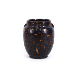A Chinese treacle-glazed earthenware vase