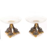 A pair of French white metal and ormolu centrepieces