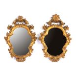 A pair of carved giltwood mirrors