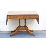 A Regency ebony strung mahogany sofa table