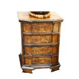 An attractive Italian walnut tall chest of four drawers