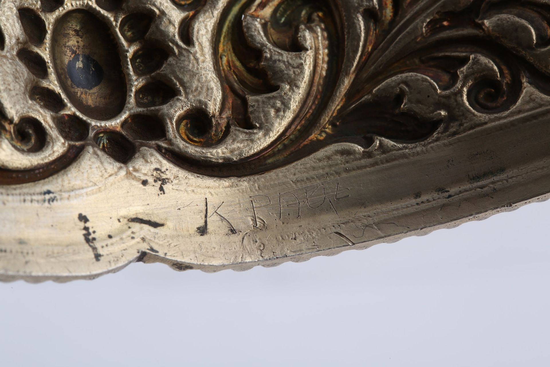 A PARCEL-GILT SILVER TIARA India, 19th century  Of typical circular form, the repoussé decoration - Image 4 of 7