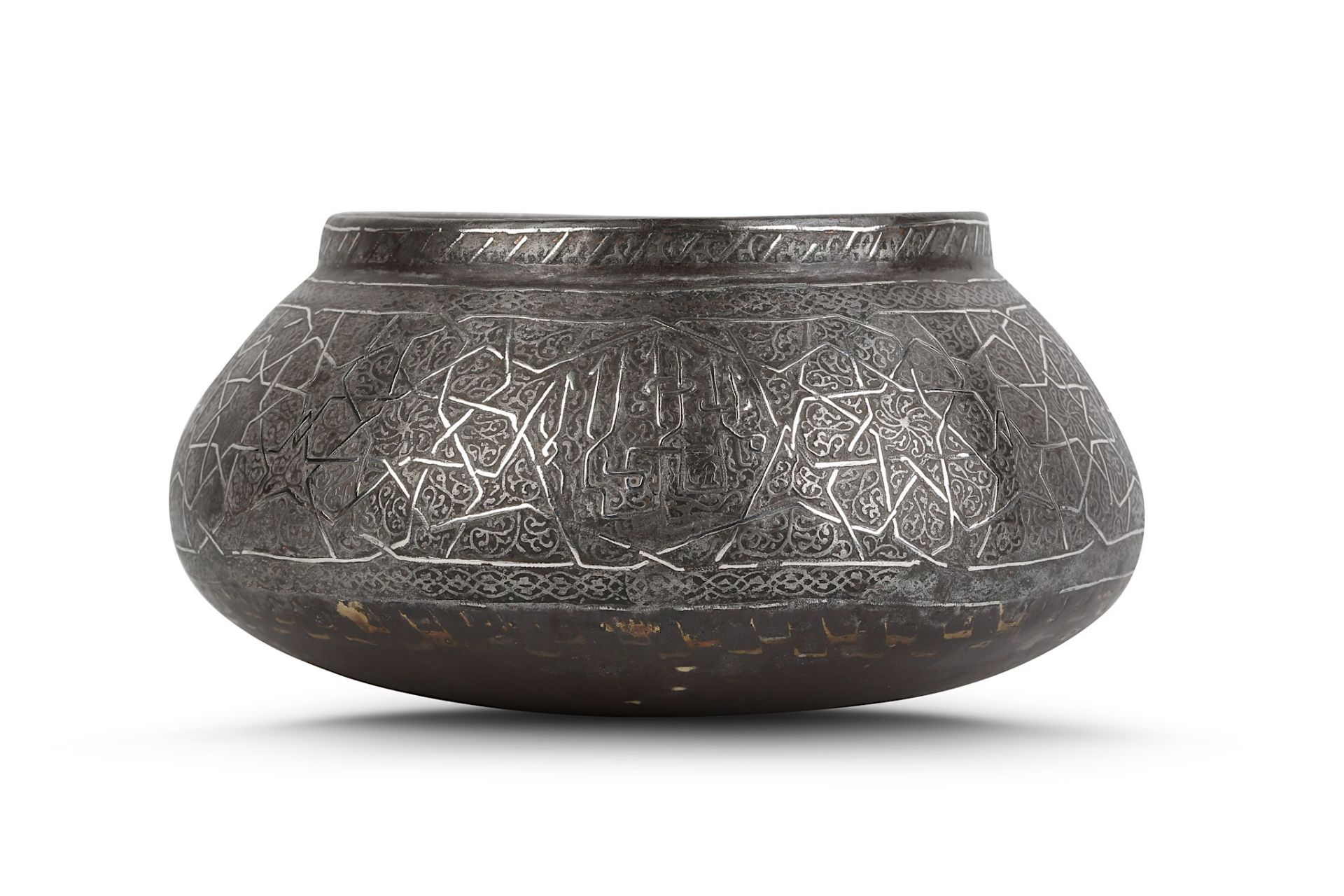 A STEEL BOWL WITH SILVER OVERLAID DECORATION Syria, late 19th century Of compressed globular