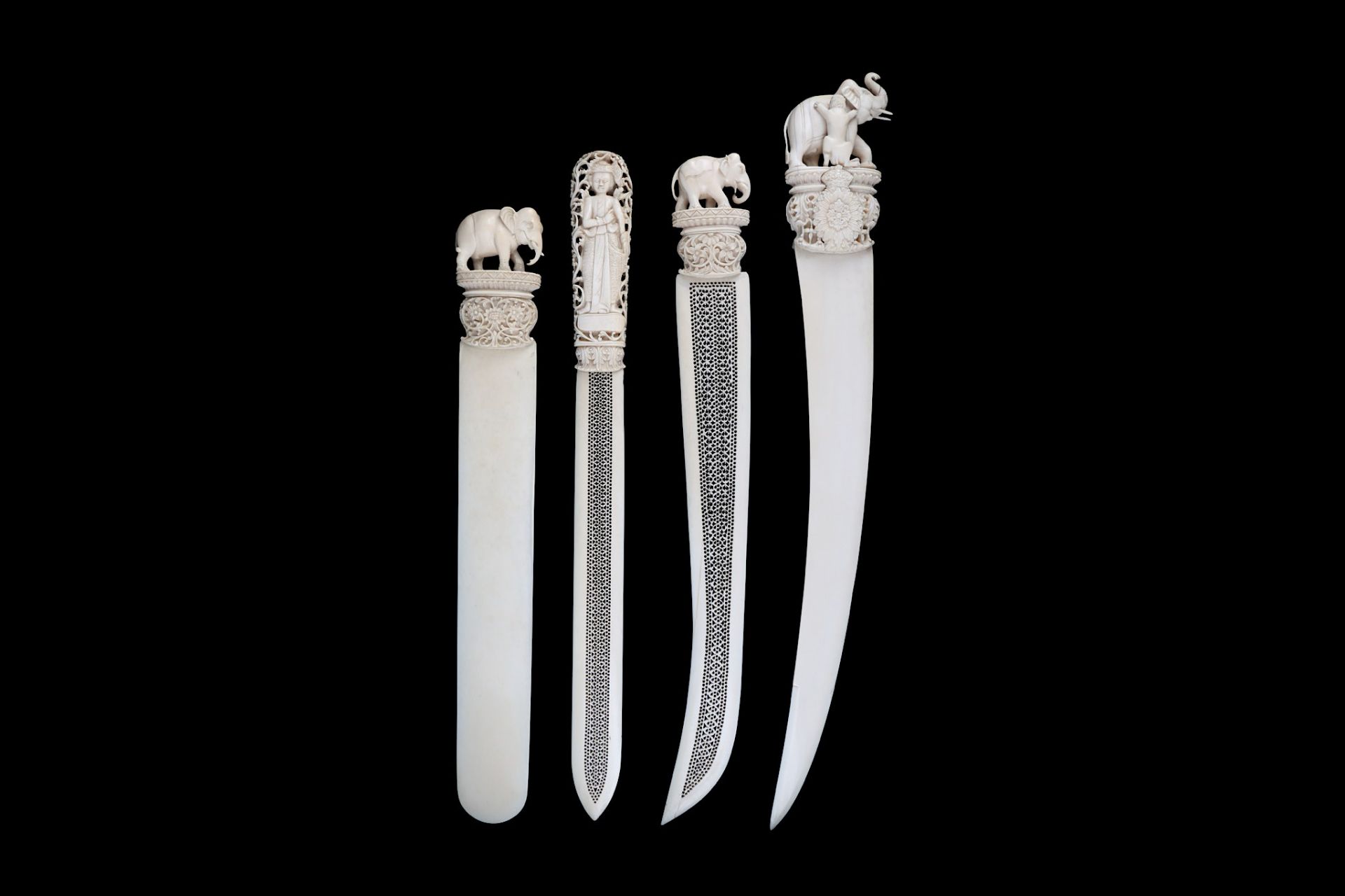 FOUR IVORY PAPER KNIVES India and Burma, 19th - 20