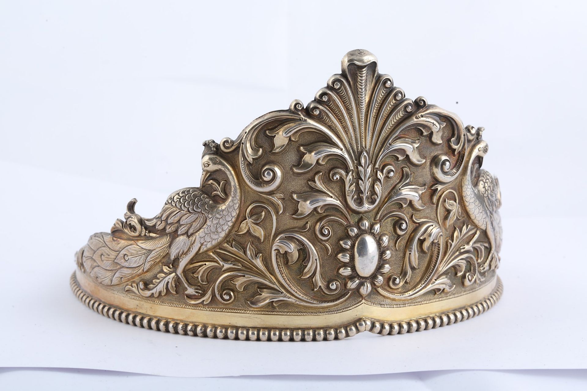 A PARCEL-GILT SILVER TIARA India, 19th century  Of typical circular form, the repoussé decoration - Image 7 of 7