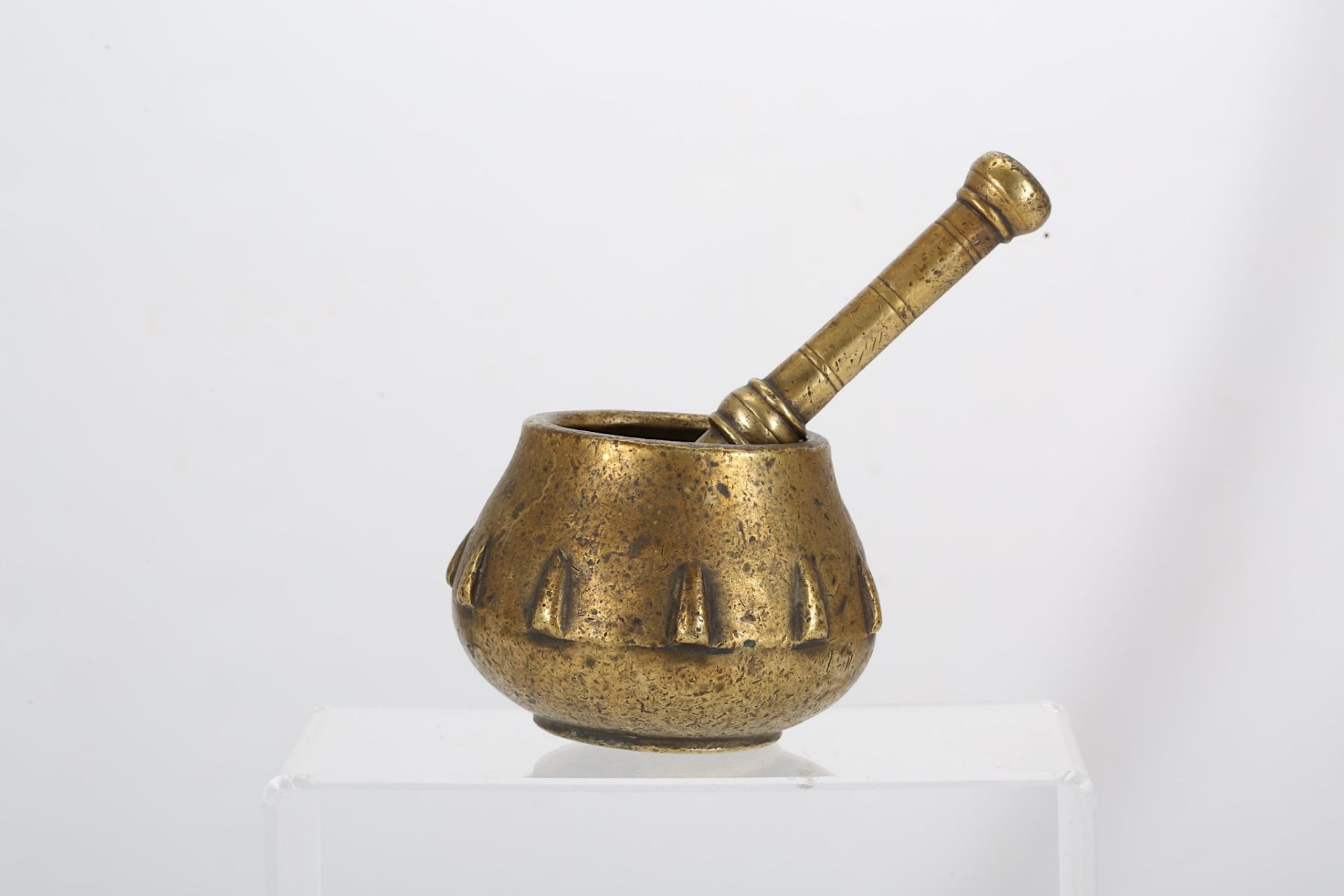 A BRASS MORTAR AND PESTLE Northern India, 18th century  The mortar of bulbous form with slightly - Image 3 of 3