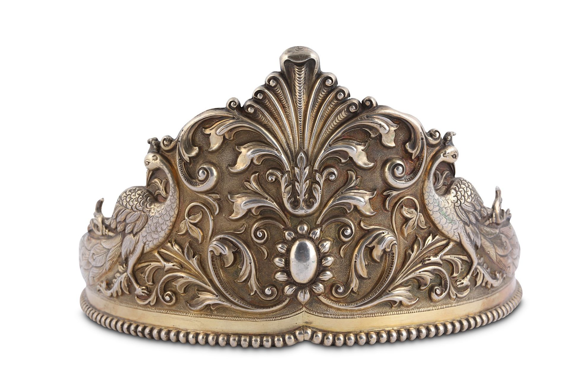 A PARCEL-GILT SILVER TIARA India, 19th century  Of typical circular form, the repoussé decoration