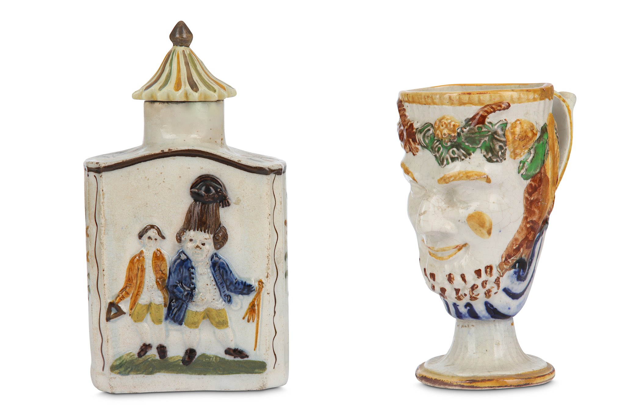 A PRATTWARE TEA CADDY AND A 'BACCHUS' FROG MUG, early 19th century, the caddy moulded with