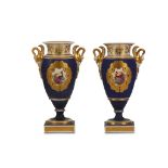 A PAIR OF CHAMBERLAINS WORCESTER PORCELAIN TWIN-HANDLED VASES, circa 1830, of urn-shaped form,