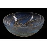 A RENE LALIQUE OPALESCENT AND FROSTED GLASS 'CHIENS' BOWL, design 1921, the exterior relief-