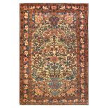 AN UNUSUAL BAKHTIARI RUG, WEST PERSIA approx: 7ft. x 4ft.9in.(213cm. x 145cm.) The field with